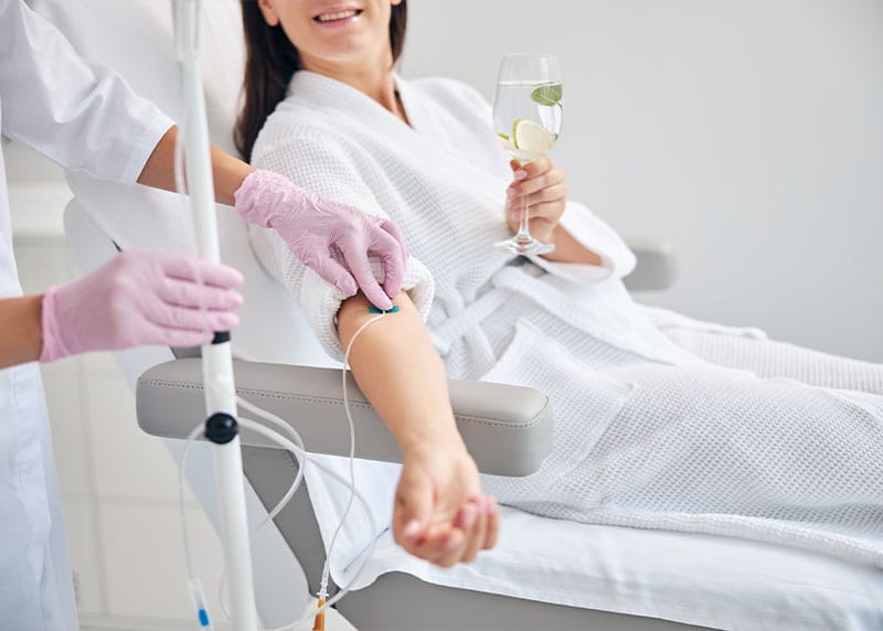 Woman receiving IV hydration in Fort Myers.