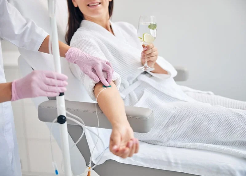 Woman receiving IV hydration in Fort Myers.